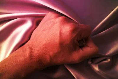 orgasm-hand-grabbing-sheet.jpg