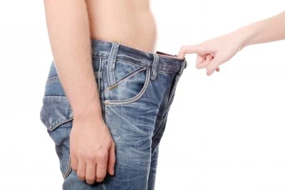 woman-looking-down-man's-pants.jpg