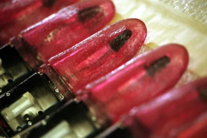 Vibrating sex toys being manufactured on an assembly line
