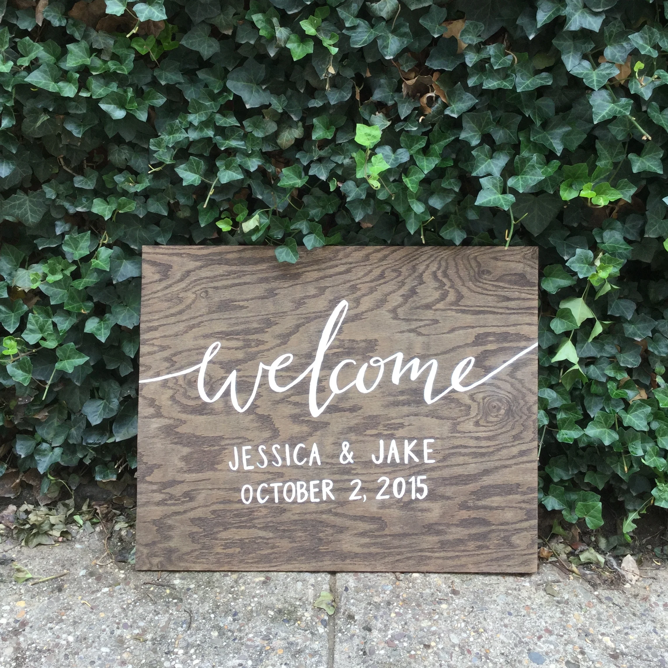 hello, bird. white ink calligraphy on board // wooden welcome sign