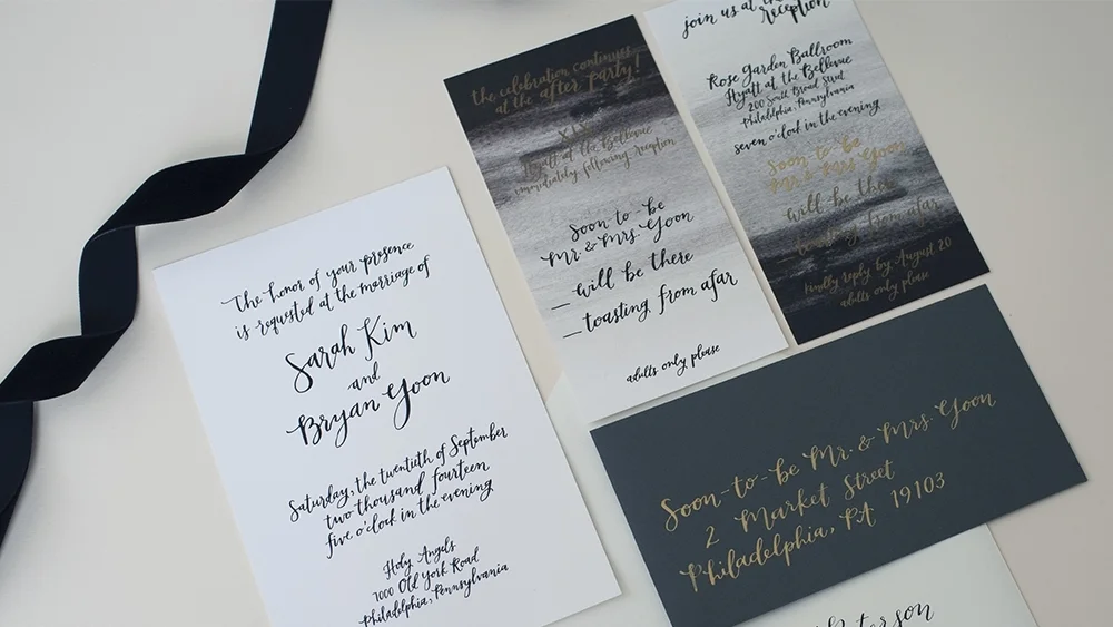 Sarah + Bryan's invitation suite by hello, bird. // black and white oversized calligraphy invitation; ombre rsvp card; gold ink on charcoal 