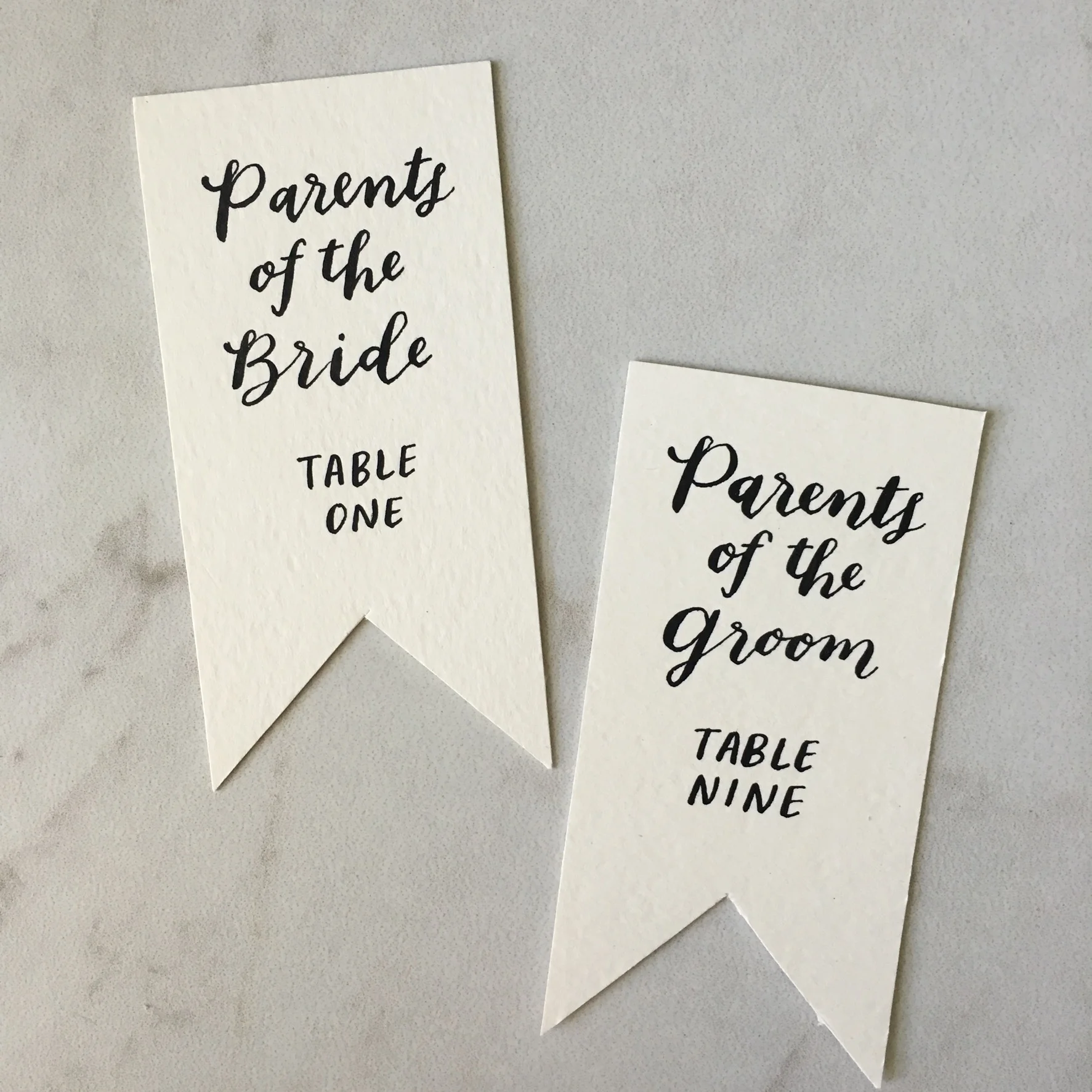  escort cards by hello, bird. // black and white escort cards // shaped escort cards 