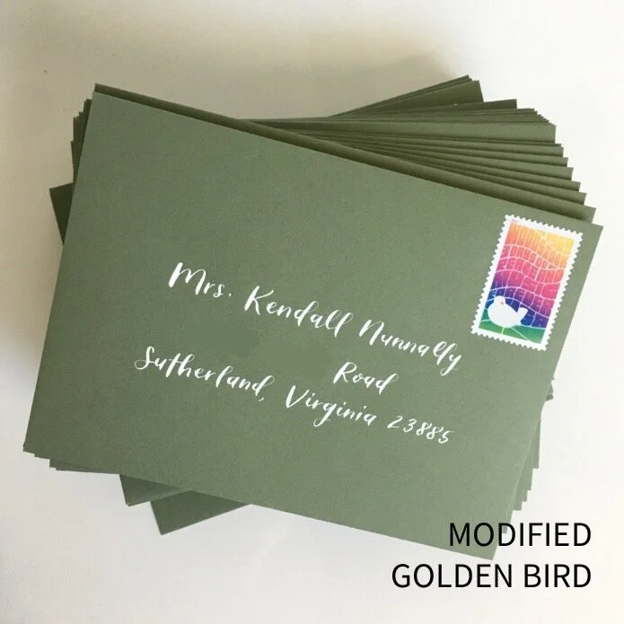  modified golden bird - with loops and softer curves on capital letters like ‘M’ and ‘N’. 