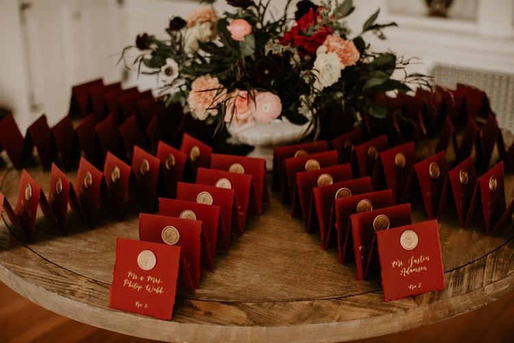 free-standing seating cards with gold ink and wax seals by hello, bird. - photo by sarah brookhart photography