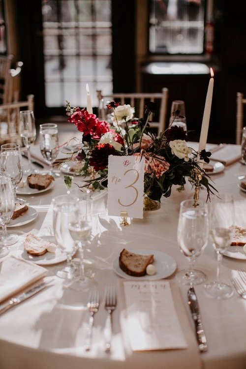 Table numbers by hello, bird; florals by Belovely; photo by Sarah Brookhart Photography