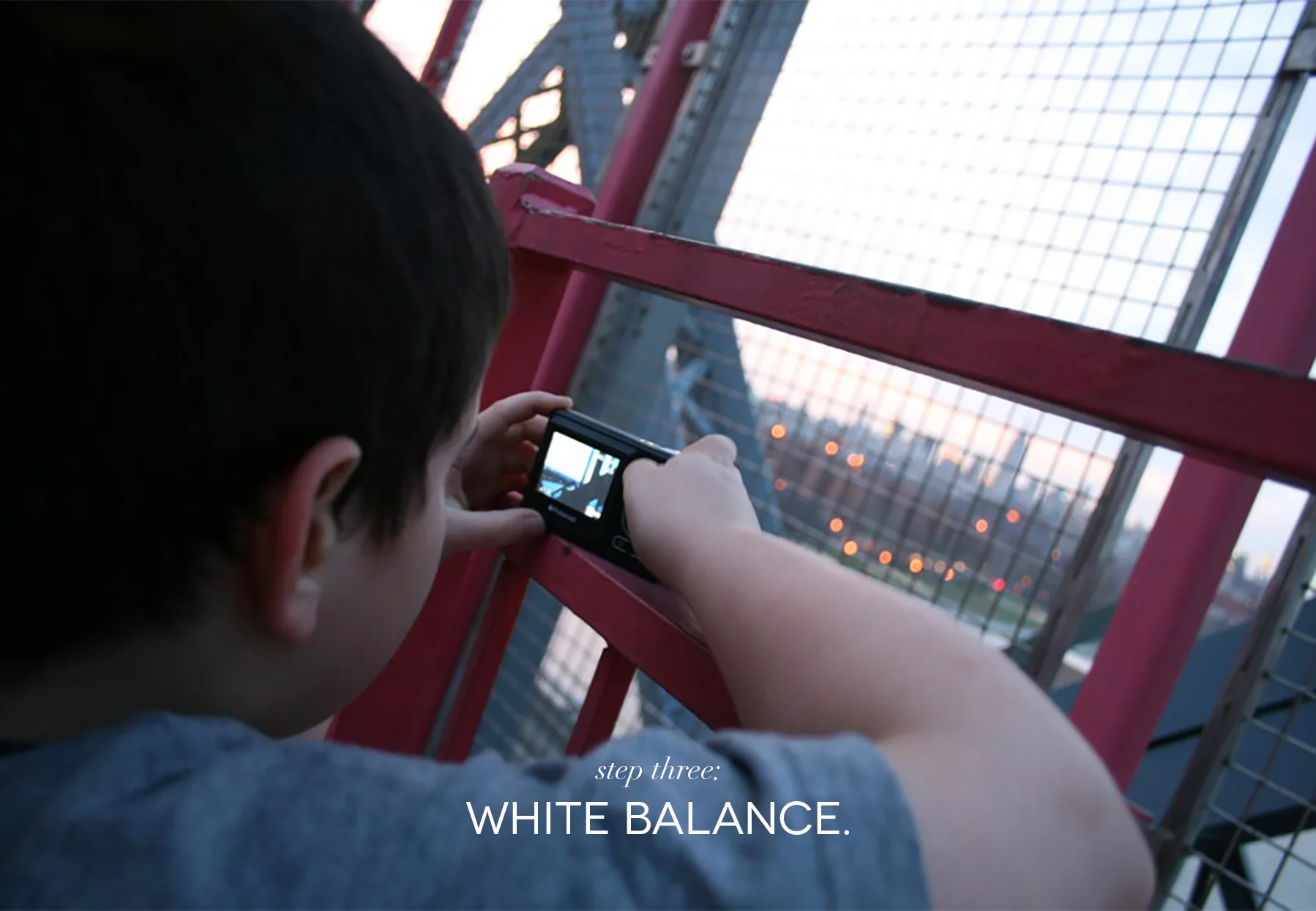 100cameras student photographer, Aries, plays with lighting during sunset on the Williamsburg Bridge during Project002: NYC. 