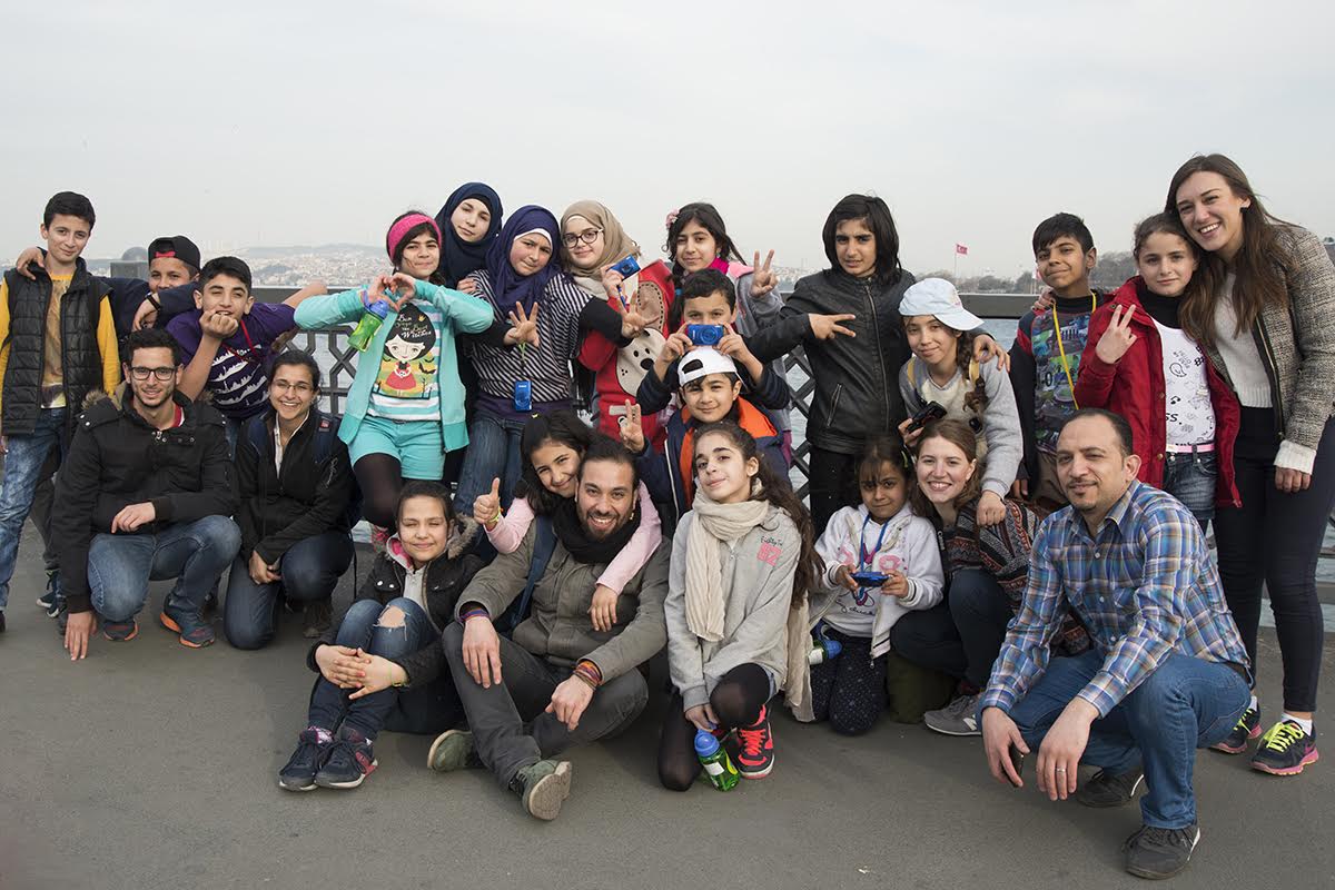 "This photograph was taken on the Galata Bridge. It connects the old city of Sultanahmet to the new city, both considered to be on the “European side” of Istanbul. This was the class’ third trip outside and I noticed how they were sharing the cameras and their ideas. In the few months we’d been together, they’d grown more curious and comfortable exploring behind the lens." -- SPL Beatrice Schachenmayr