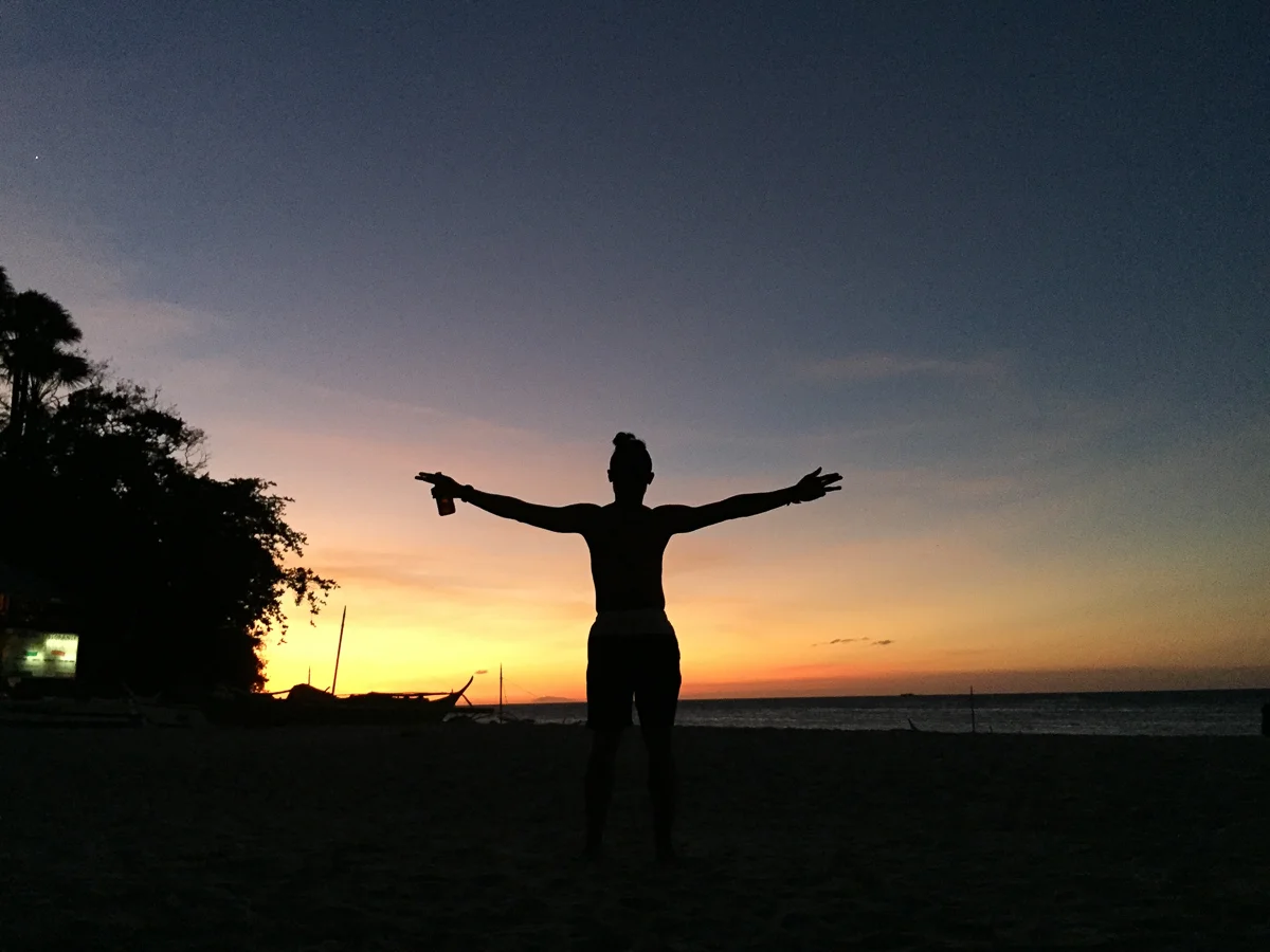 Got a cold beer in hand, watching a gorgeous tropical sunset on the beach. A perfect afternoon on the islands. (Photo: Jess Cuenca)