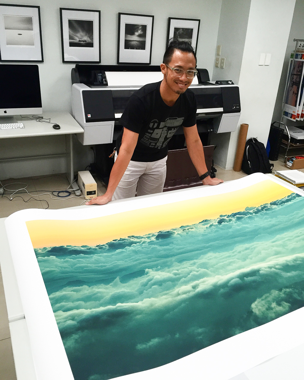 Inspecting a 40x60in print of "Distant Oceans" on Tecco PFR295 at Redlab