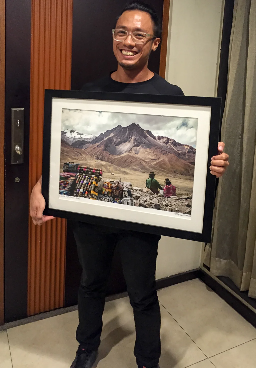 Holding the winning photo the night I found out about winning
