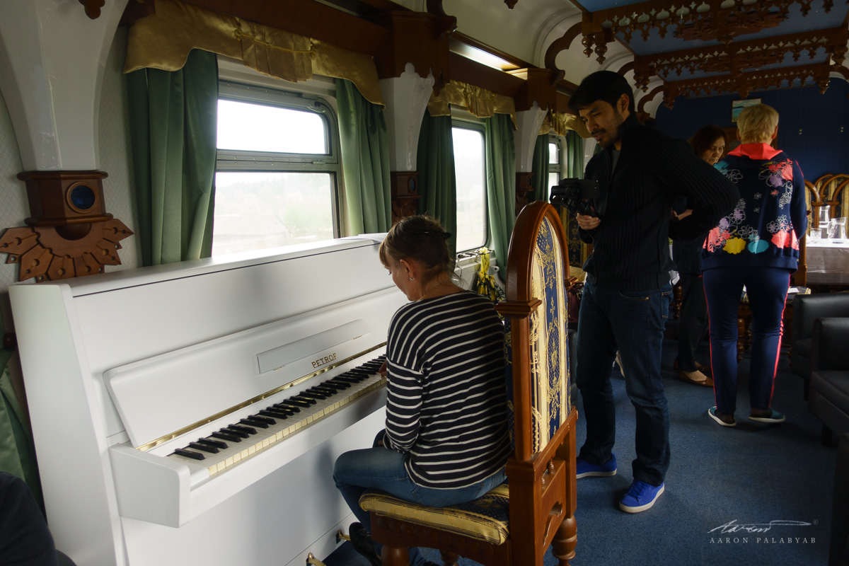 At the lounge car learning Russian songs