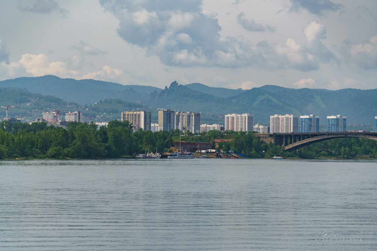 Across the river, we see some rock formations atop mountains, a national park I wish we'd had time to visit.