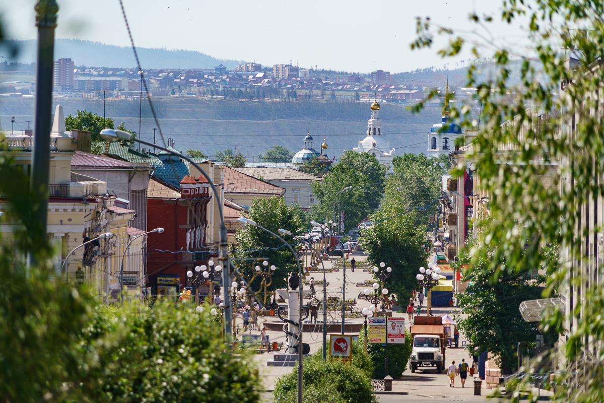 Looking down the road towards Arbat Pedestrian Street and the Holy Cathedral Odigitrievsky at the end of the road