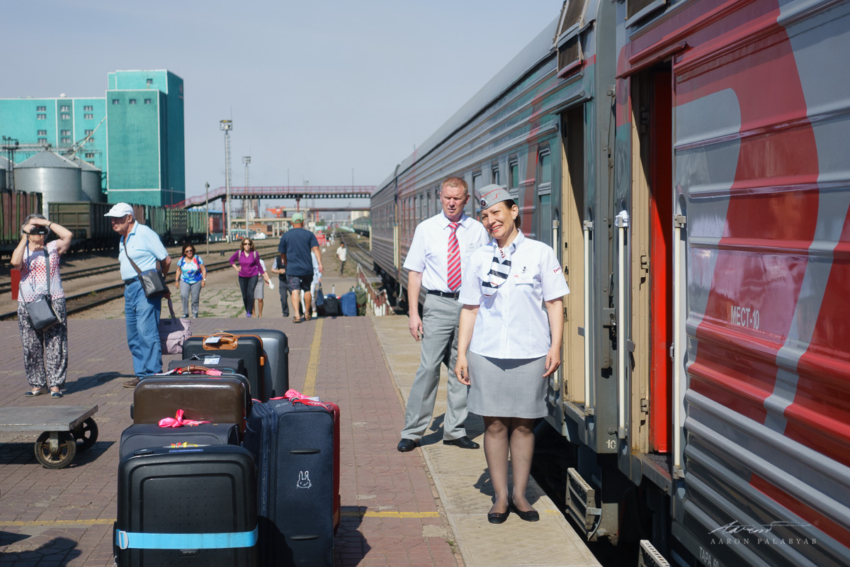 Saying goodbye to our cabin attendant, who has taken good care of us the entire journey