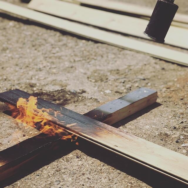 Bespoke charred-wood cladding underway for a project nearing completion on The Thames