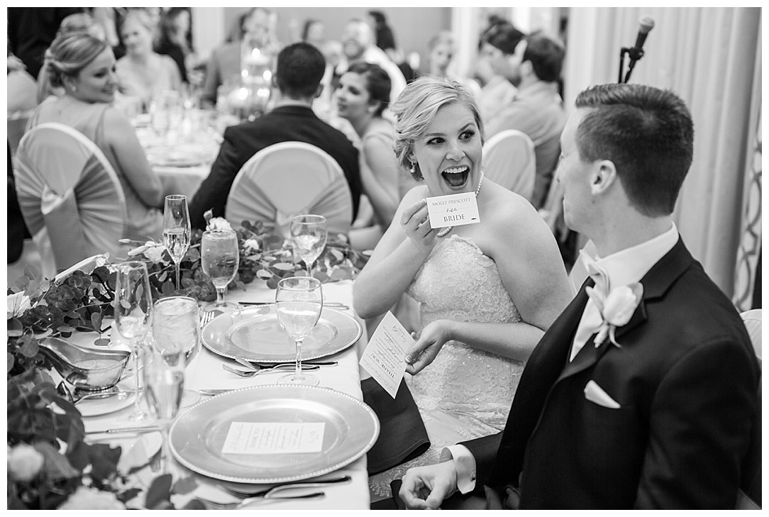I love her face as she sees her new name on the place card! 