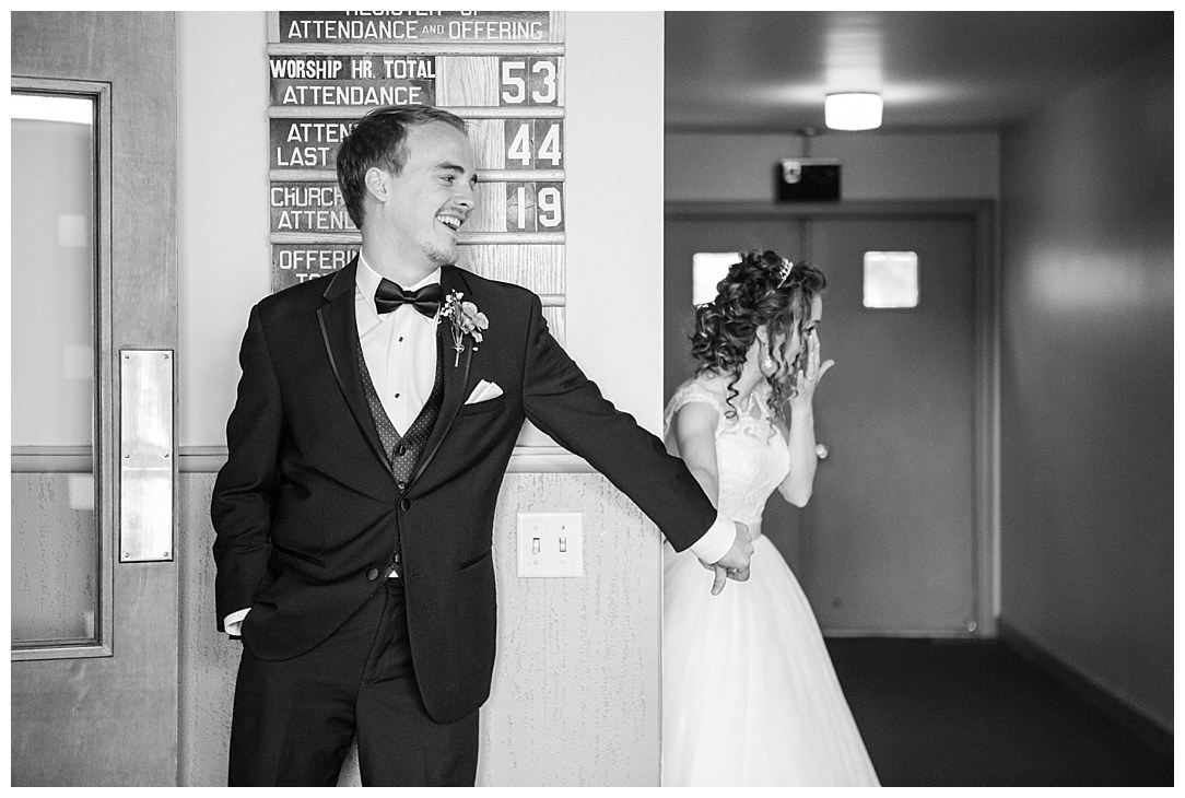 Jennifer and Josiah decided to not see each other before the ceremony, but they wanted to pray together, so (without) seeing each other, they held hands around a corner and prayed a beautiful and emotional prayer together in those long minutes before the ceremony.