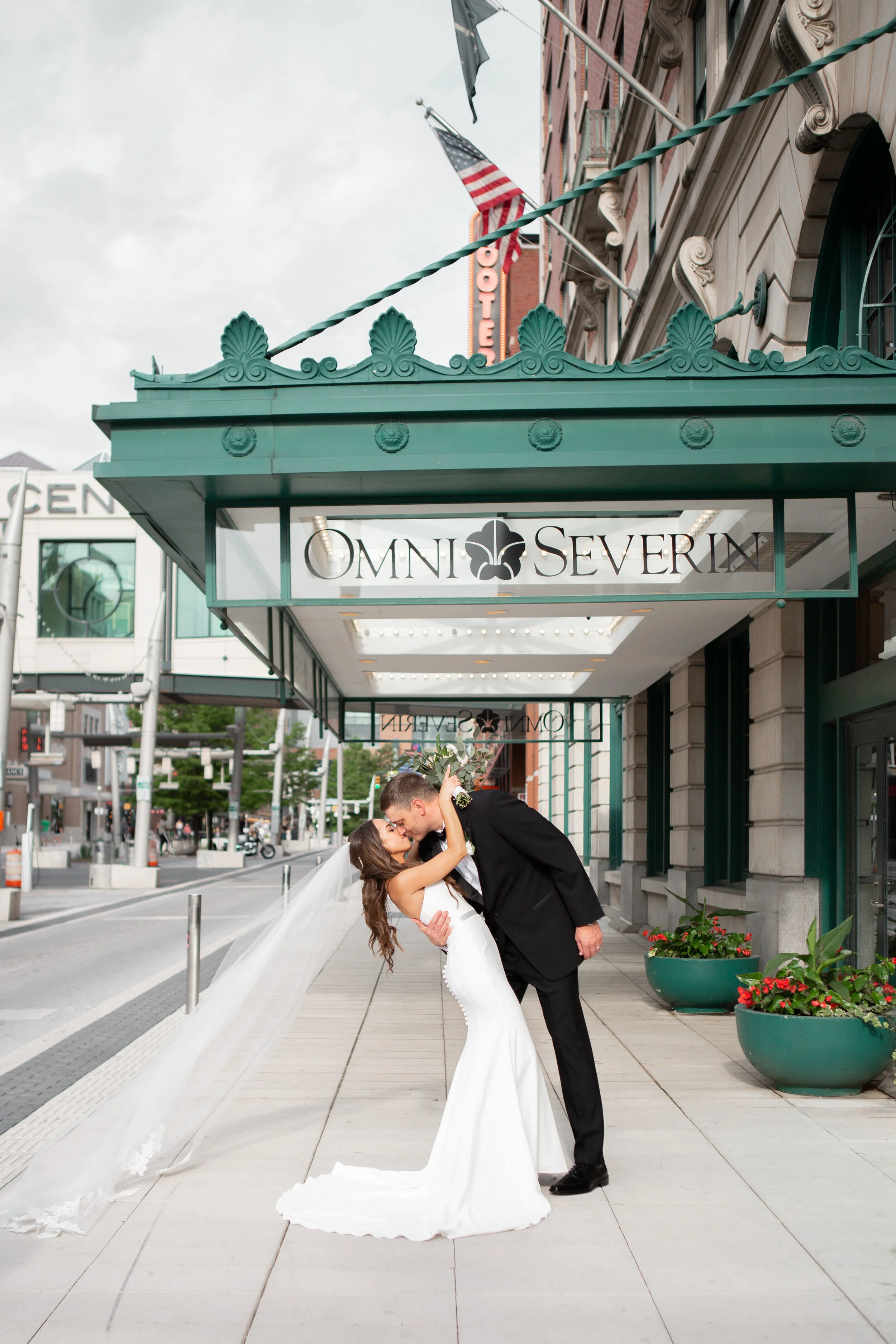 Emily and David's Summer Wedding at the Omni Severin Hotel