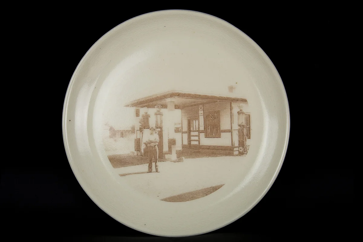 Harold at the Filling Station 2016. Glaze and fired-on decals on porcelain. - 9.25” diameter