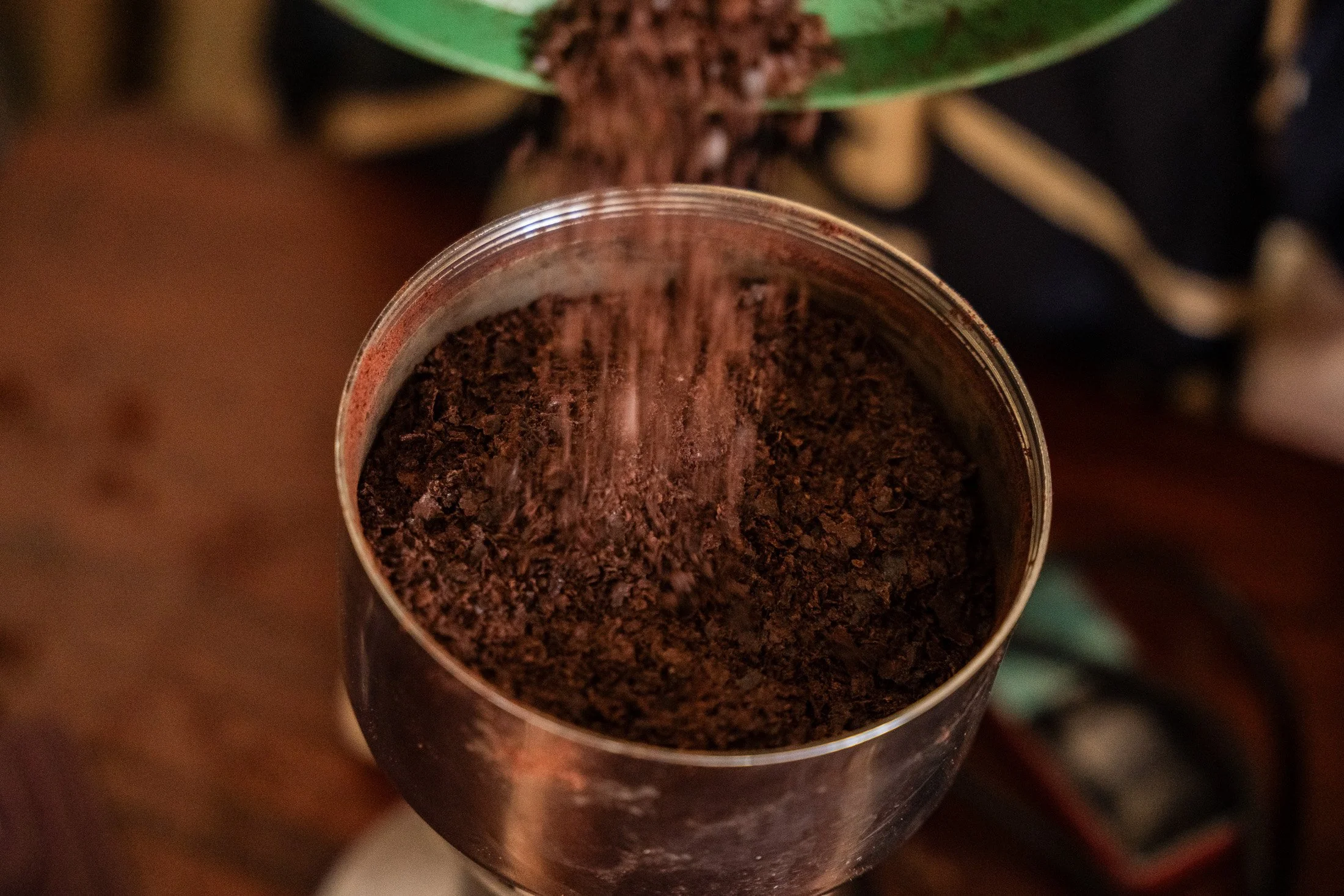  The process of making cocoa powder from cocoa nibs.Location: Mababu Ward, Kyela District, Mbeya Region, Tanzania.Photo By: Michael Goima 