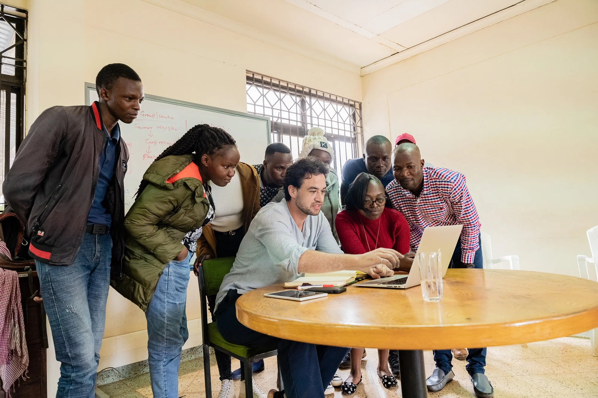 AKFC International Youth Fellowship fellow leading a group discussion with youth fellows as part of a training activity in Kenya.