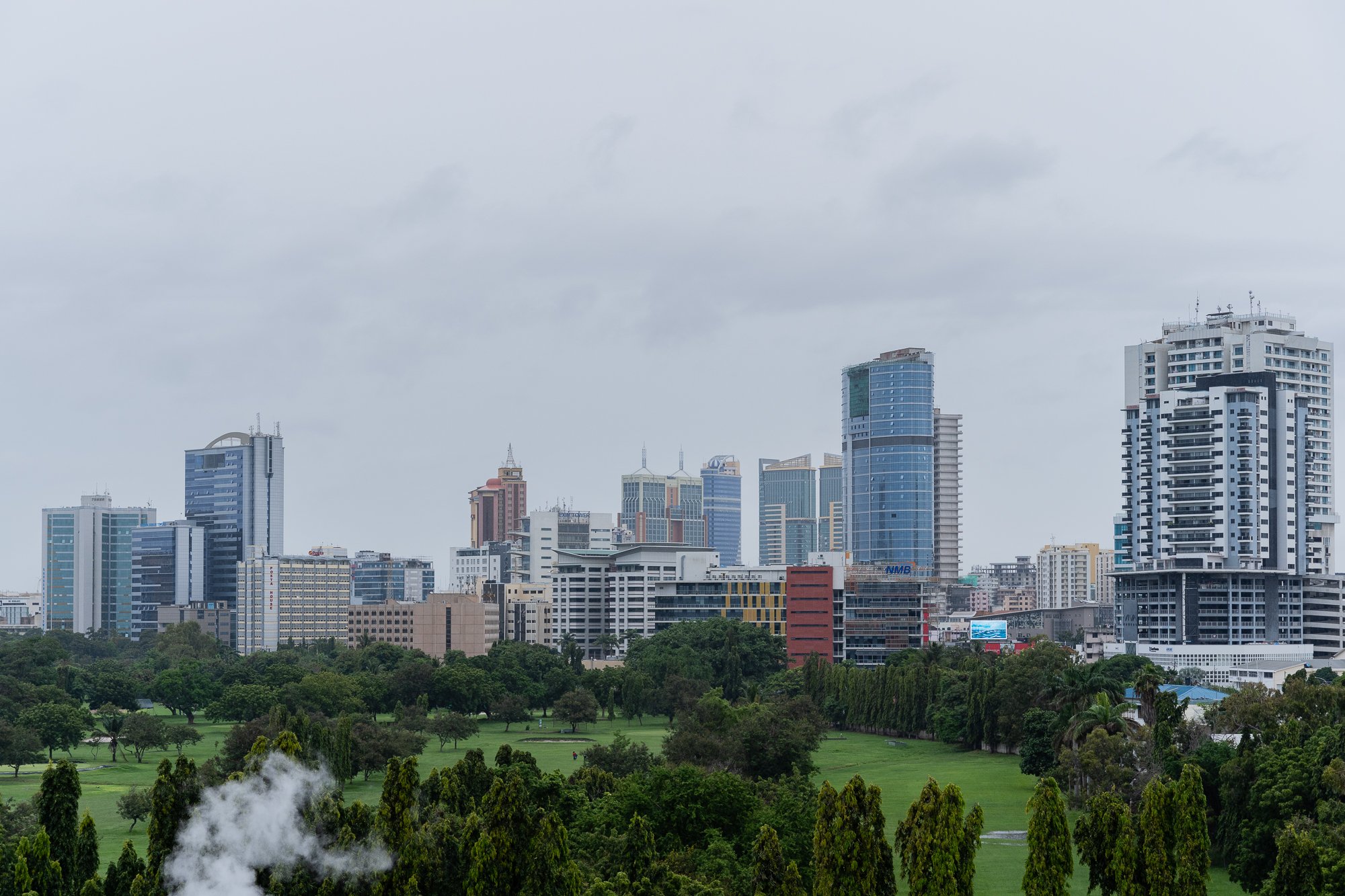 City skyline of Dar es Salaam, providing urban context for AKFC International Youth Fellowship activities.