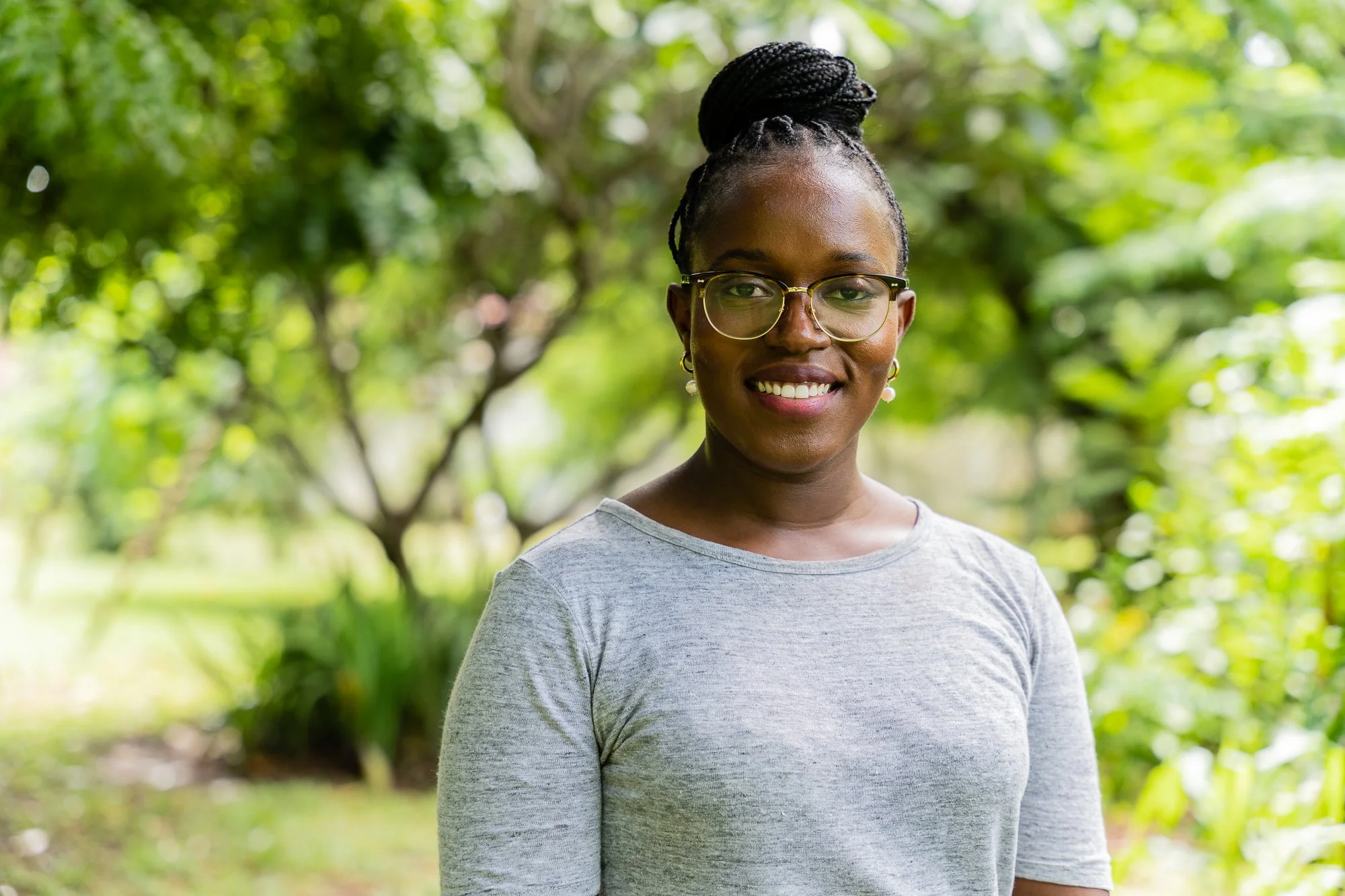 Environmental portrait of a young woman participating in an AKFC International Youth Fellowship program in Dar es Salaam, Tanzania.
