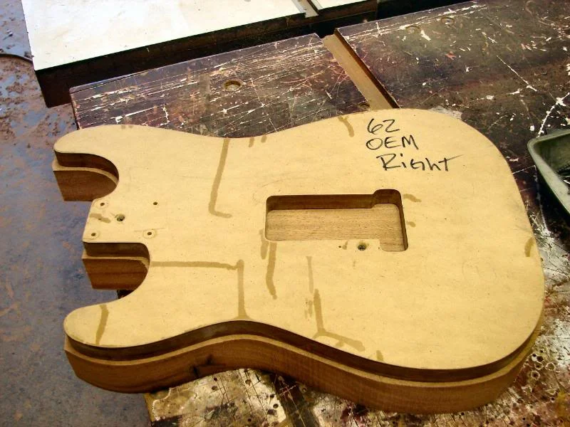 I now mount the template firmly. No tape. I use wood screws..long ones.