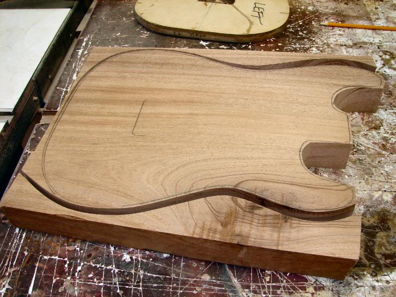  A one piece Mahogany, and well dressed S.&nbsp;I have taken a 13 ½ inch wide section of Mahogany. Planed it to the approximate thickness, of 1 &nbsp;7/8 then using the panel sander to take it down to almost 1 ¾.&nbsp;Use the template to trace out th