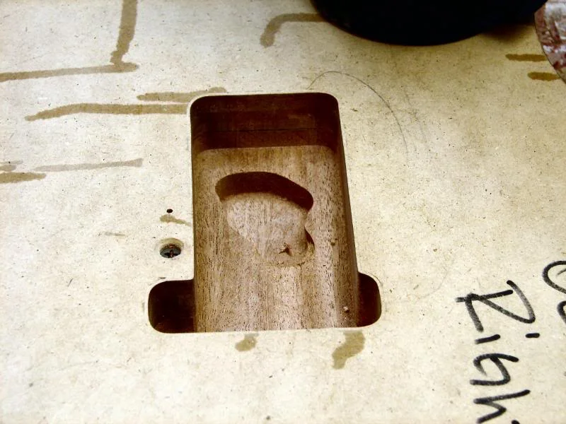 After that or before, whatever you feel like, do the tremolo spring rout. I do it in 2 steps initially. Once it’s ¾ inch deep, remove the template. Were done with it.