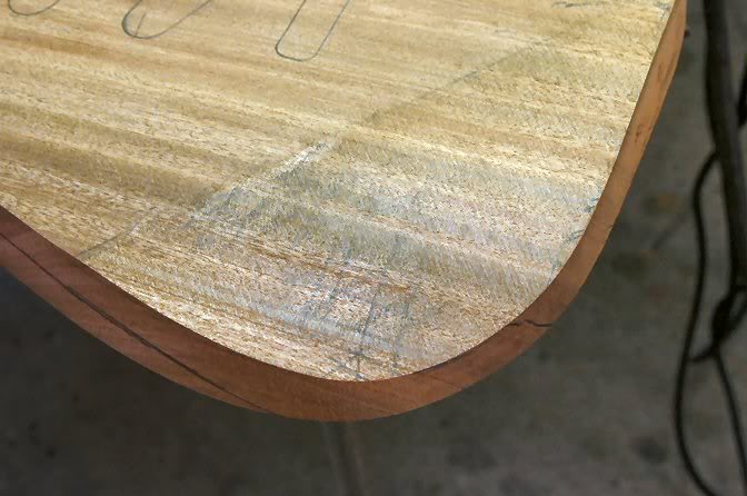 Now, continue sanding, watching the darkened areas as they disappear.