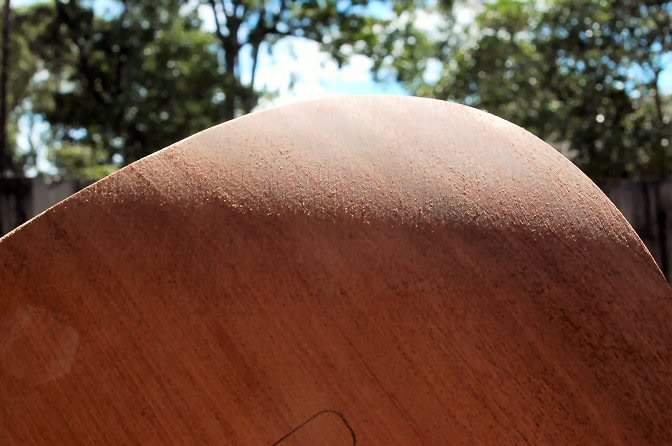 Now I use a tool I store 93 million miles away. It’s the best indicator you can find. The shadows will show any areas that aren’t evenly sanded and will reveal any lumps in the continuous roll of the contour.