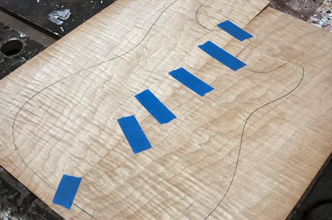 Now match the veneer’s edges and tape it into one sheet. Then rough cut the shape out of the veneer. Use scissors, X-Acto knife, whatever….