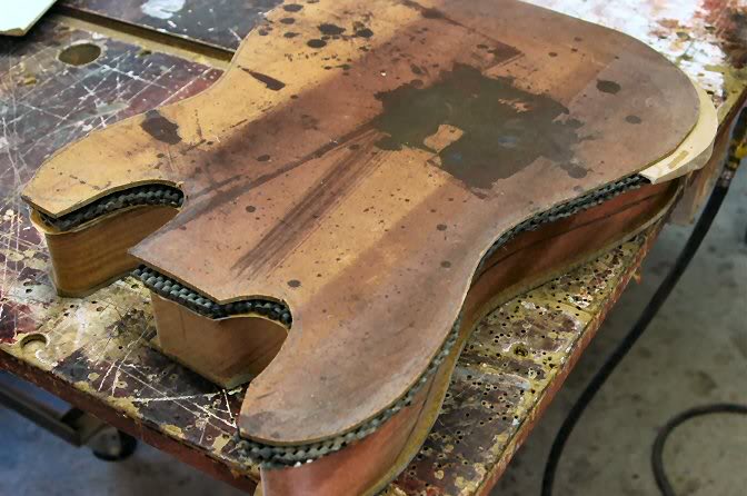 I now put a top plate on the sandwich, this is Masonite.