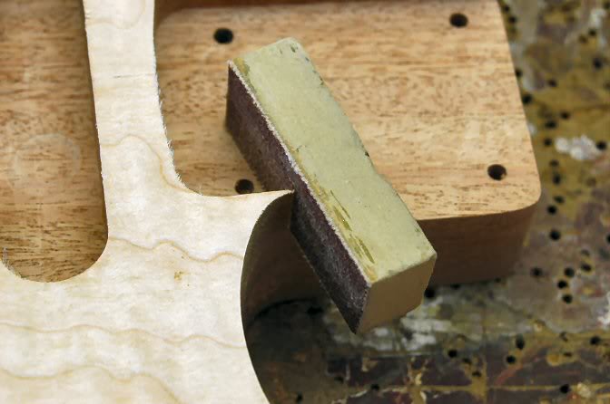 Do a little clean up, so there are no loose chips that can get snagged and rip some of the delicate edges loose. The block is a small piece of MDF ¾” square, and about 2 inches long. I make dozens and keep them handy.