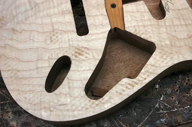 While doing the electronics cavity, do the jack hole too.. both will be 1 1/2inch deep, I Do this in 2 stages too.