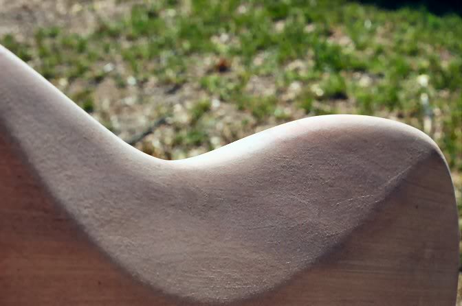 Give it a good sanding then step into the sunlight to check the progress.