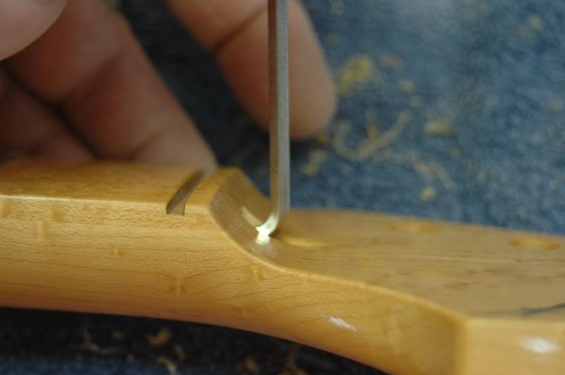  Now I want to adjust the truss rod to bring the neck to as level a state as possible.&nbsp;I always set the truss rod so the tension is pulling the neck to the correct setting as opposed to releasing the tension to do the same. 