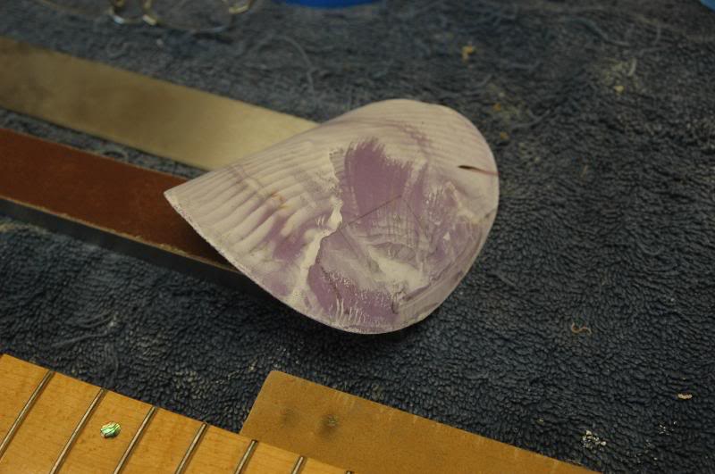  I make a habit of saving used sandpaper from about 300 grit to 500, I use it to rough polish the frets. 