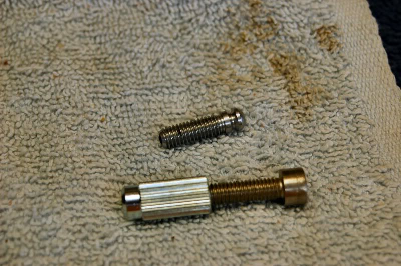  The studs are driven into the body. To keep from buggering up anything, I run in a stainless bolt into the threads, then I can bang away all day without harming anything. 