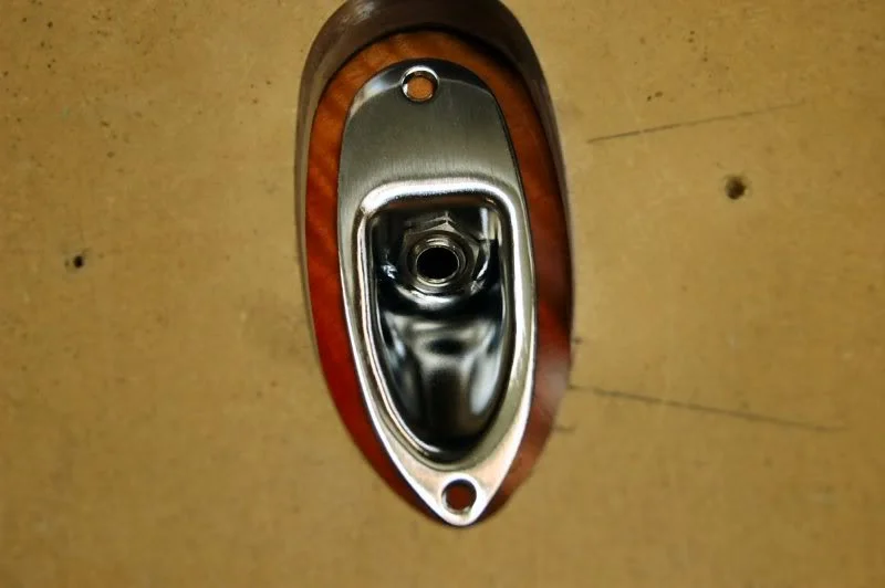 Place the plate on the guitar body in the approximate location.