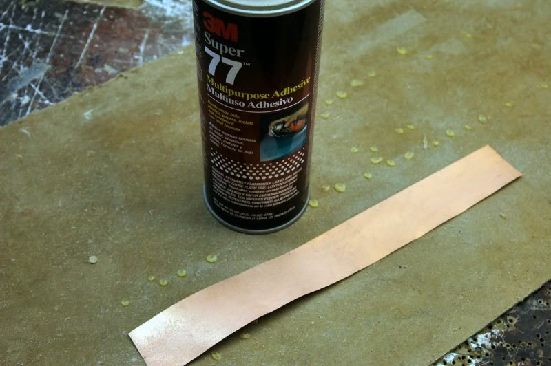  Then apply adhesive to the back side of the walls. This holds it in place until it’s soldered.   