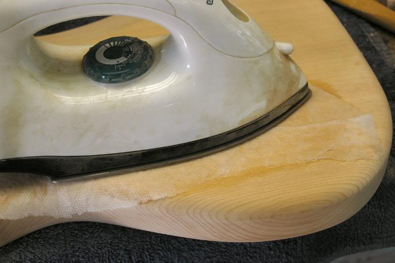  To take care of a larger surface, wet the paper towel and iron away. 