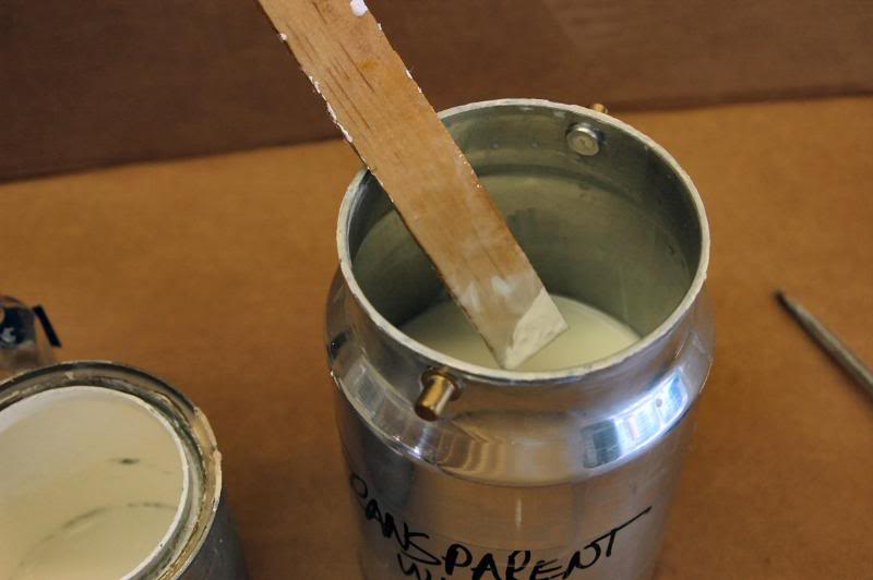  Then I add a stick tip full of white tint. Tint differs from dye because it is opaque, and can, if enough is used, produce a completely opaque white lacquer. I just add touch to produce something that is like watery milk. This gives me something tha