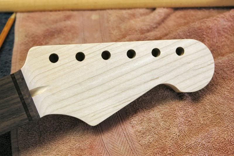  The USGA neck arrived, in the typical Tommy Rosamond fashion. Impeccable. But since the headstock needed to be reshaped, there was a little work to do prior to finishing.   