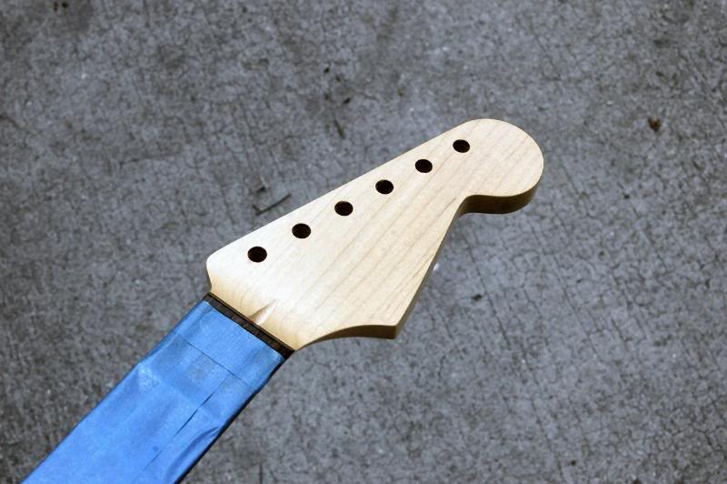  If you have a fingerboard that doesn’t require lacquer, do not forget to mask it. 