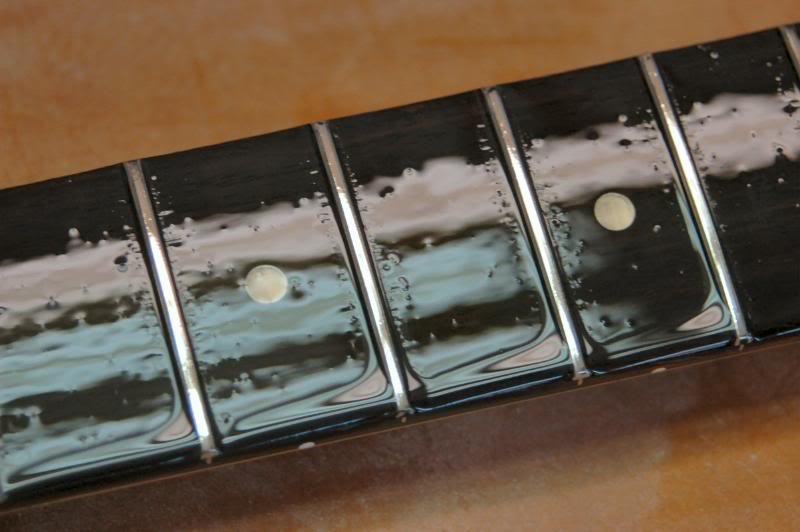  I’ve already sanded with 400 grit, no polishing is really required. The act of playing the guitar will press the strings into the frets burnishing them. But that’s not the way I do it, mine go out so highly polished, I get calls asking how I do it….