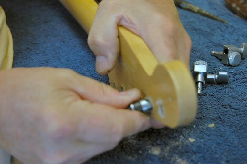  Reaming leaves lacquer curled up... remove it with a small countersink by hand, and then place the keys in the holes. 