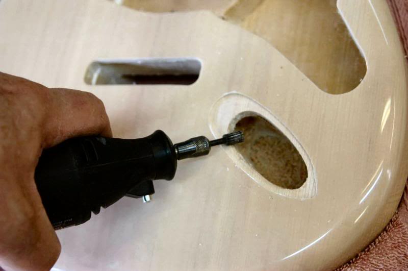  Because the underside is rounded due to the stamping process, you must relieve the hard edge. I use a Dremel. 