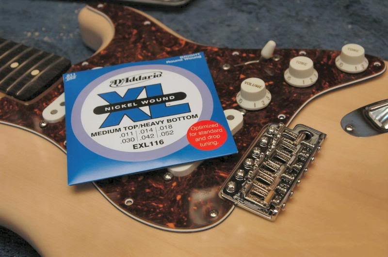  Now… I guess I’ll use D’Addario 11’s. String ‘er up. Want me to show ya that too? Nah… I didn’t think so. 